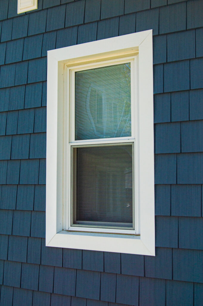Energy efficient double hung window on blue siding, Newington, CT